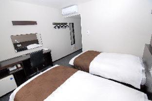 Hotel New Amami Quarto foto